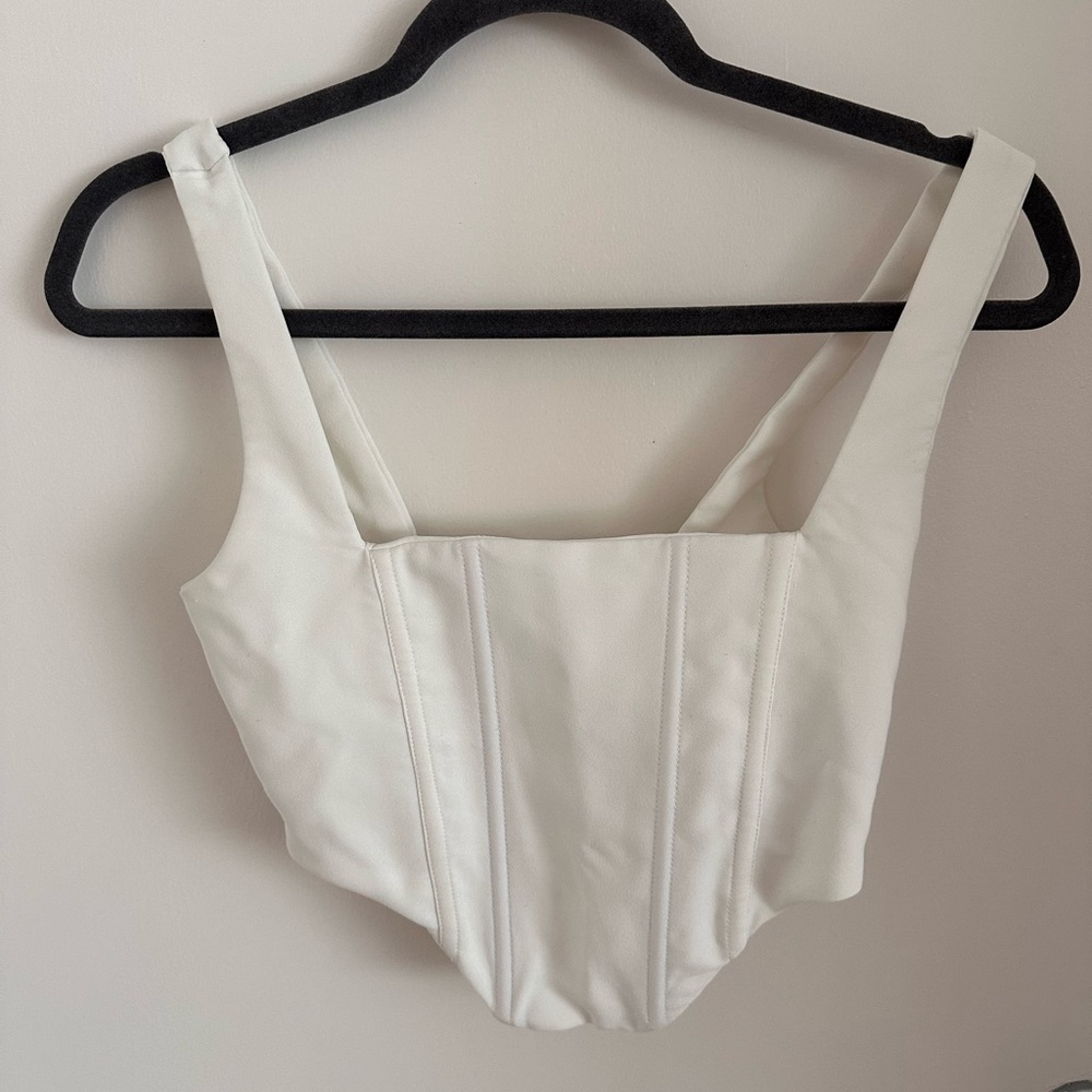 White corset-style crop top